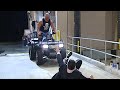 “Stone Cold” Steve Austin chases Mr. McMahon on an ATV