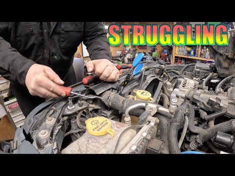 Part of a video titled SPRING HOSE CLAMP REMOVAL MADE EASY - YouTube
