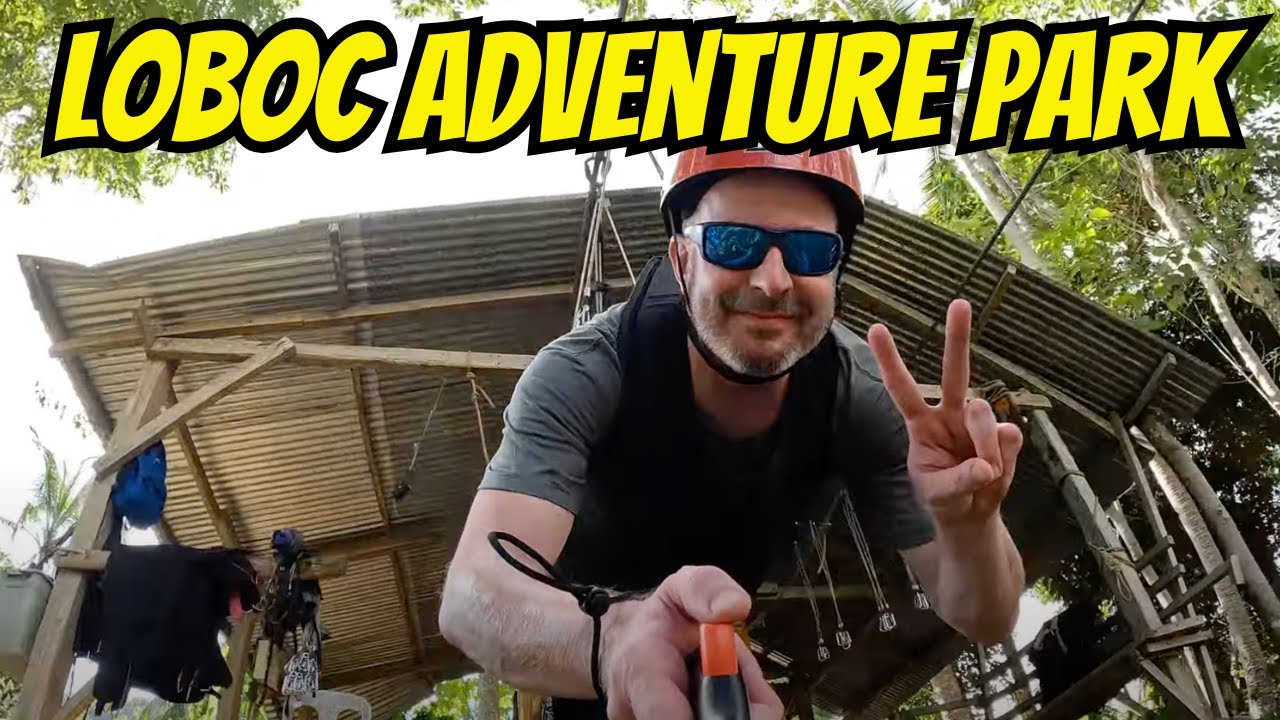 Join a traveler on zipline adventure through Loboc Ecotourism Adventure Park.