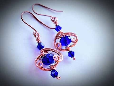 Fingerswirl Earrings Bicone and Rondelle - Cheryl St. Pierre of Majestic Wire Artworks