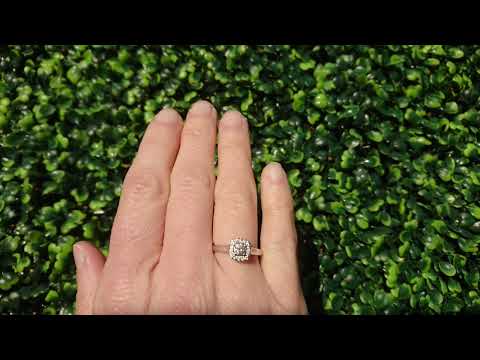 An 18 carat white gold diamond cluster ring