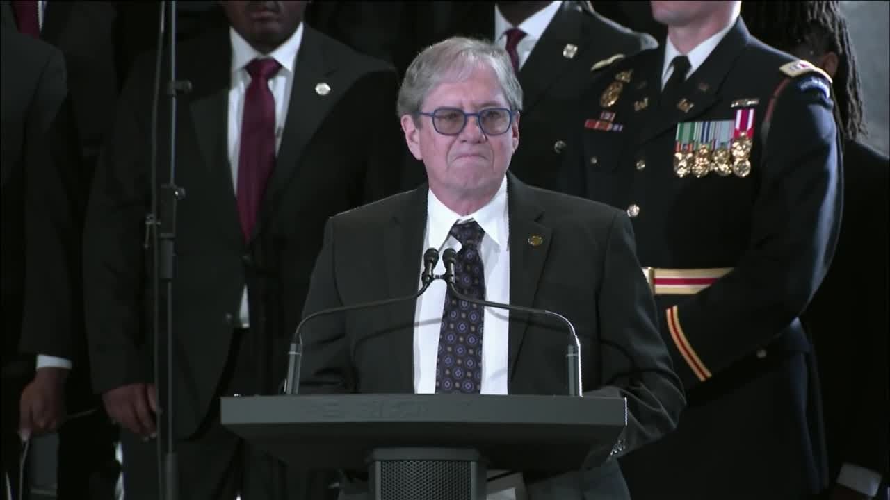 Jimmy Carter's son speaks at Carter Center memorial service