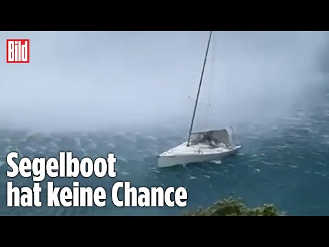 Wirbelsturm über See: Segelboot wird gnadenlos mitgerissen