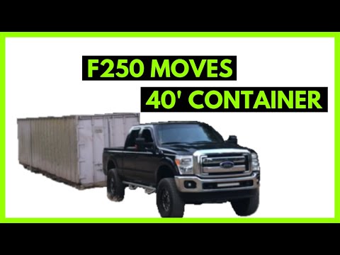 Part of a video titled Moving a 40' Storage Container with a F250 and Homemade Dolly