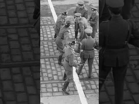 West Berlin police and East German officials confront each other at the border in Berlin. #shorts