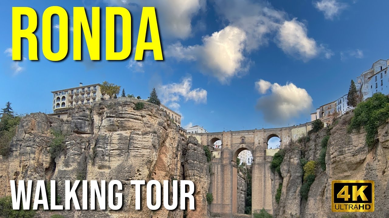 Immersive street-level walking tour through Ronda Puente Nuevo, Spain, showcasing authentic urban landscapes, local architecture, and the vibrant atmosphere of the city's neighborhoods