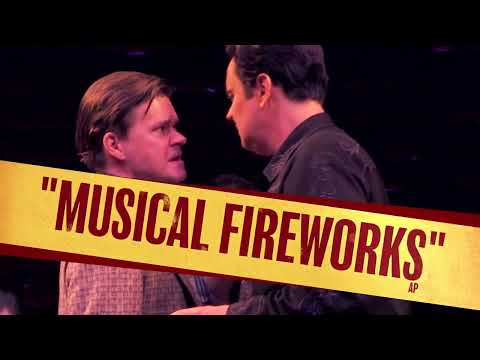 Concert-style finale moment with silhouettes of the Million Dollar Quartet band rocking out