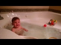 Baby Splashing In Bathtub