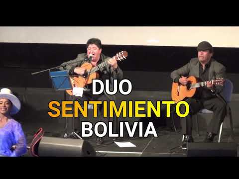 LLORAN Y BAILAN DE EMOCION "DUO SENTIMIENTO" EN EUROPA MUSICA CANTO Y MELODIA CON HISTORIA BOLIVIANA