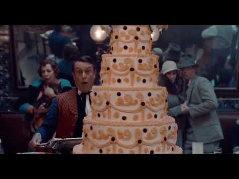 Hugo (2011) trailer still: Hugo peers through the Gare Montparnasse clockwork