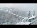 Snowfall Graces Zhangjiajie Glass Bridge
