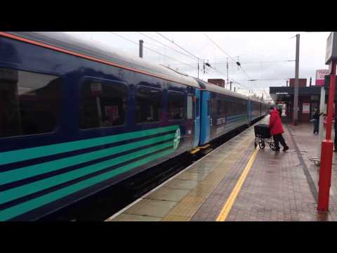 (HD) DB Schenker 90020 and new DRS loco 68002 pass Wigan on 5X69 5th February 2014