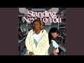 Standing Next To You