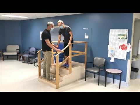 Walking up and down the stairs with a cane