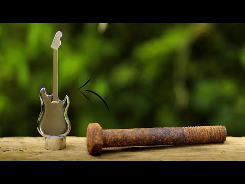 Turning a Old rusty Hex Bolt into a beautiful GUITAR from start to finish.