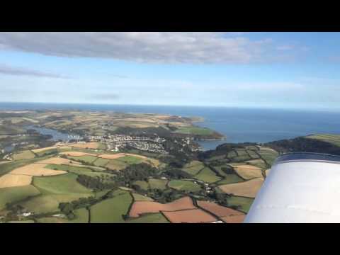 Flying out of Bolt Head with view over Salcombe