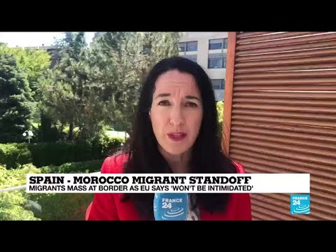 Spain vows to restore order after thousands swim into Ceuta from Morocco