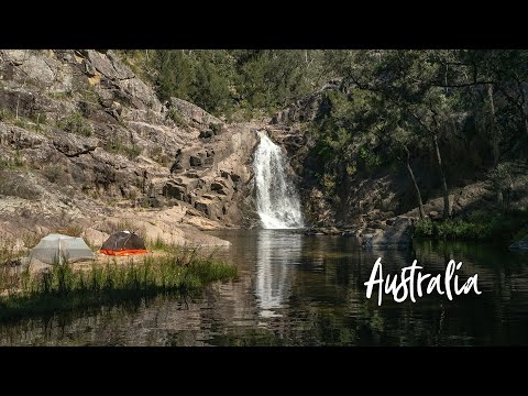 Wild camping on a sandy beach below an EPIC waterfall
