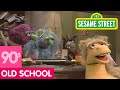 Sesame Street Benny Makes Repairs To The Furry Arms