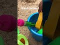 Building sand castles with beach moulds!  Holiday trip