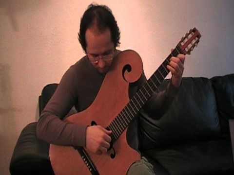 Feste Lariane- Luigi Mozzani, Emil Petrov playing a guitar by Luigi Mozzani