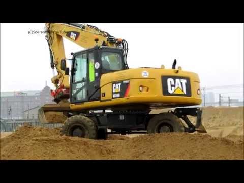Bagger CATERPILLAR M316D belädt Trecker mit Dumper - Soeren66