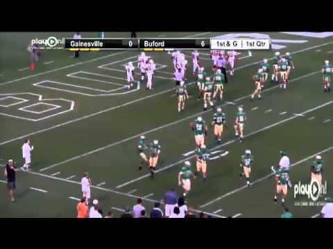 Zavior Hoxie of Buford runs in the short TD to open up scoring