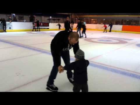Paul learning to skate with daddy