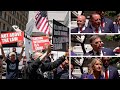 Watch: Protesters shout over Trump allies outside court