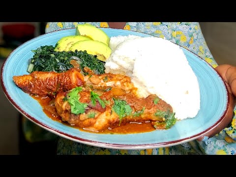 Chicken stew with Kenyan Ugali and spinach.