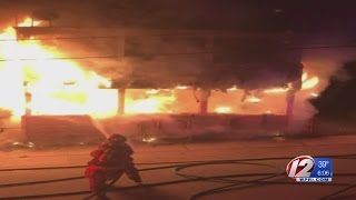Central Falls police rescue residents from house fire
