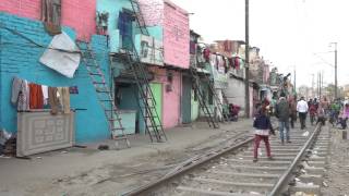 Improving Sanitation in Slums Adjacent to Railway Tracks: Case of Delhi