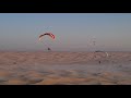 Paramotor Flying Over Foggy Desert In Dubai