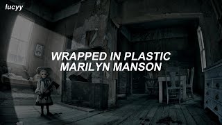 Wrapped In Plastic : Marilyn Manson (Spanish / English lyrics)