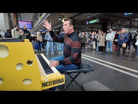 Train Station Boogie Piano Burning in Lucerne by Nico Brina