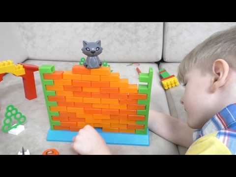 Max plays with a toy brick wall  Hello Max