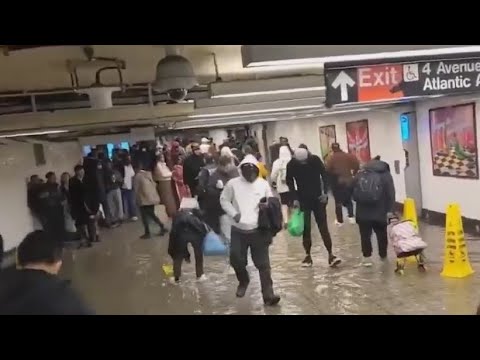 Water floods Brooklyn subway station during rush hour