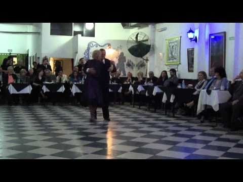  Delia Nasra  and  Aurelio Filippini  are  dancing  to  a  vals