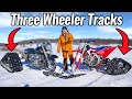 Three Wheeler Snow Riding On Tracks