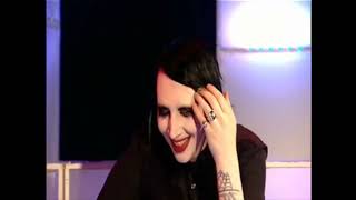 Download lagu Marilyn Manson comments on the Raining Blood scene in his 'Heart-Shaped Glasses' video mp3