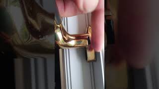 How to unlock an espag handle on a hinged window that is stuck shut.