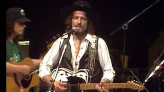 T For Texas by Waylon Jennings from his Waylon Live album.
