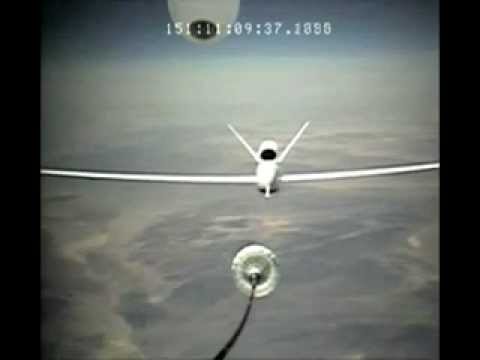 Global Hawk RQ-4 UAV Unmanned Aircraft Fly in Close Formation  during Autonomous Aerial Refueling