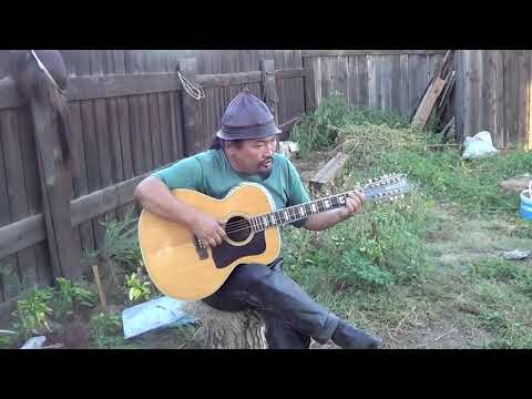 TUVA—Gennadiy Chamzyryn (born 1971) sings and plays.