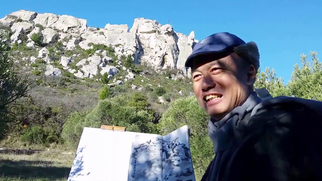 Henry Li plein air sketching and painting at les baux provence france