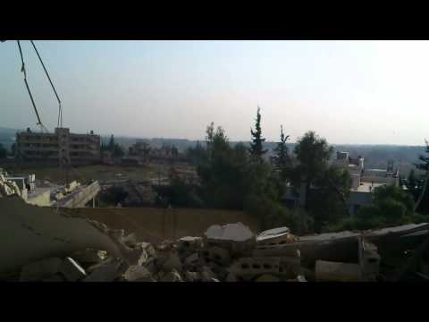 اشتباكات بين عناصر لواء أمجاد الإسلام وقوات النظام في خان العسل