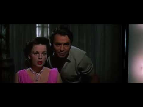 A Star Is Born (1954) trailer still with Judy Garland and James Mason at a Hollywood gala