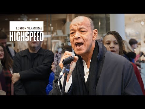 Roland Gift surprise festive performance at St. Pancras International