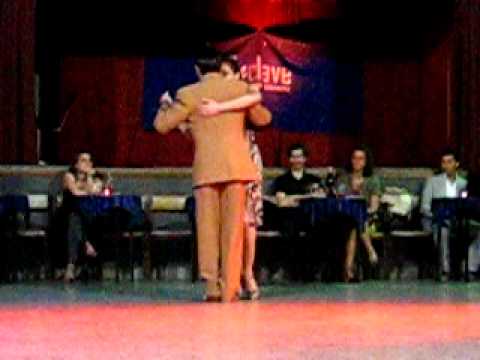 Paola Tacchetti  and  Alejandro Hermida  are  dancing  to  a  milonga