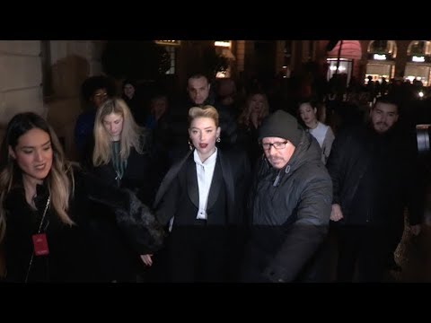 Amber Heard creates mayhem at Giorgio Armani HC Fashion Show